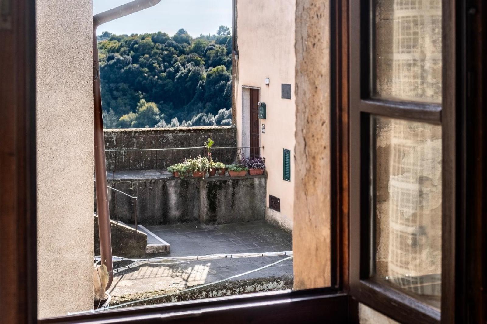 La Soffitta Nel Bastione Apartment Pitigliano Bagian luar foto