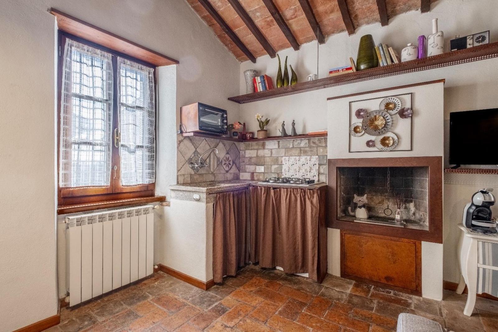 La Soffitta Nel Bastione Apartment Pitigliano Bagian luar foto